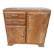 Vintage wooden buffet with a marble top.