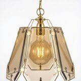 Pair of vintage pendant lights in smoked glass and gold metal, Hollywood style.