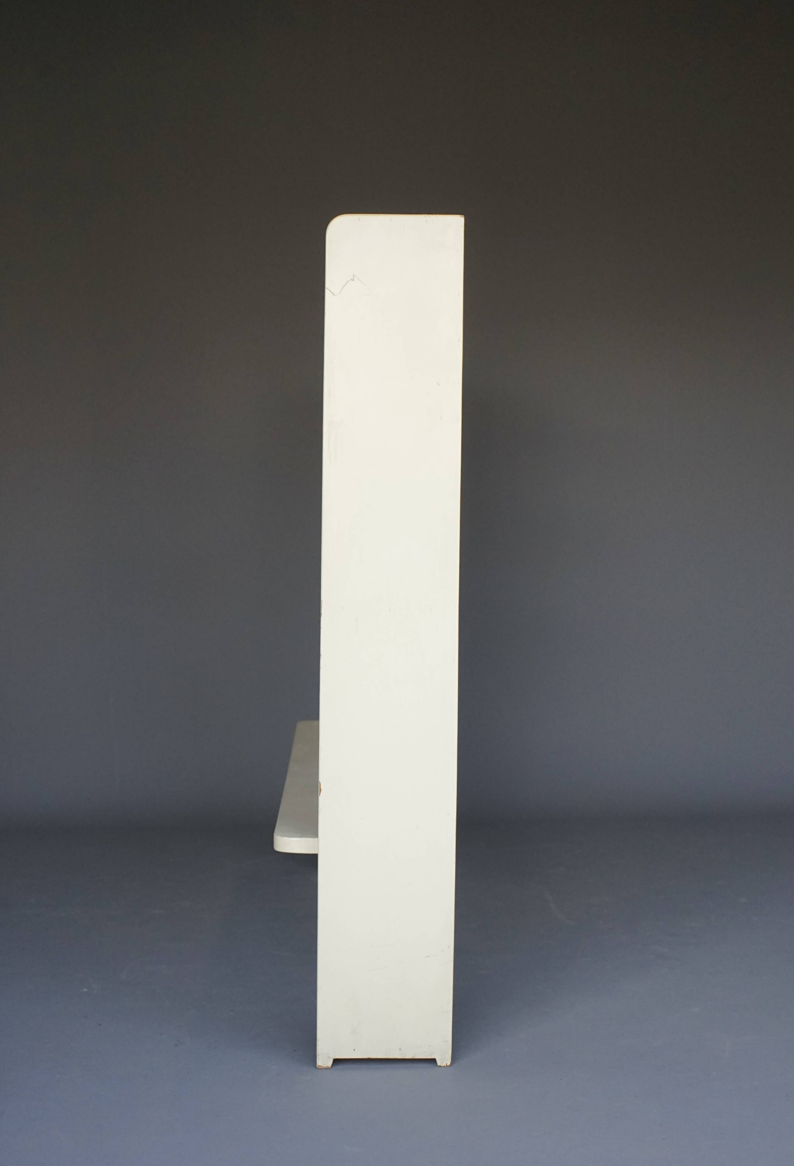 A Dutch wooden 1940s shelving unit in Modernist style