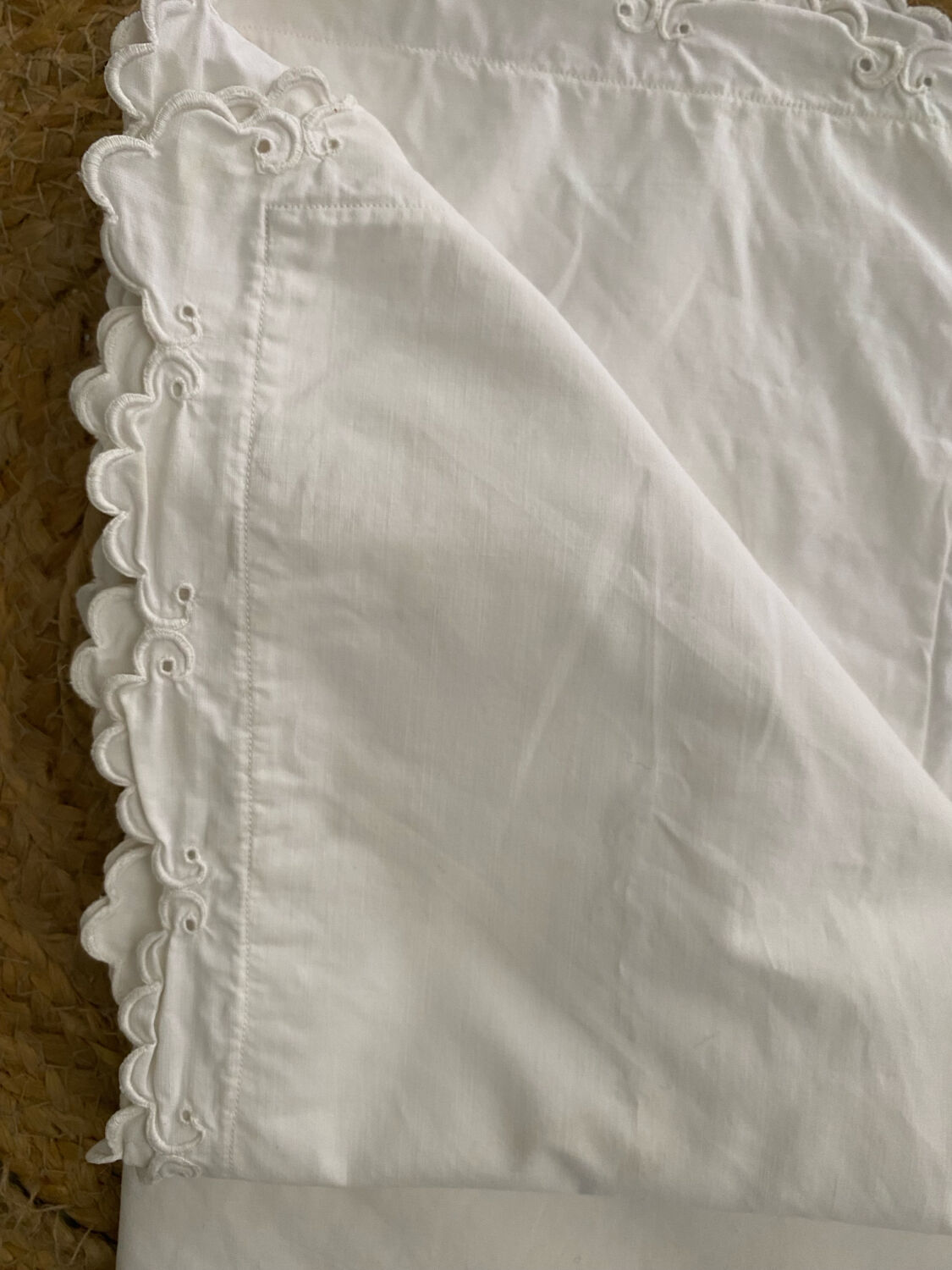 White cotton pillowcase with monogram BC.