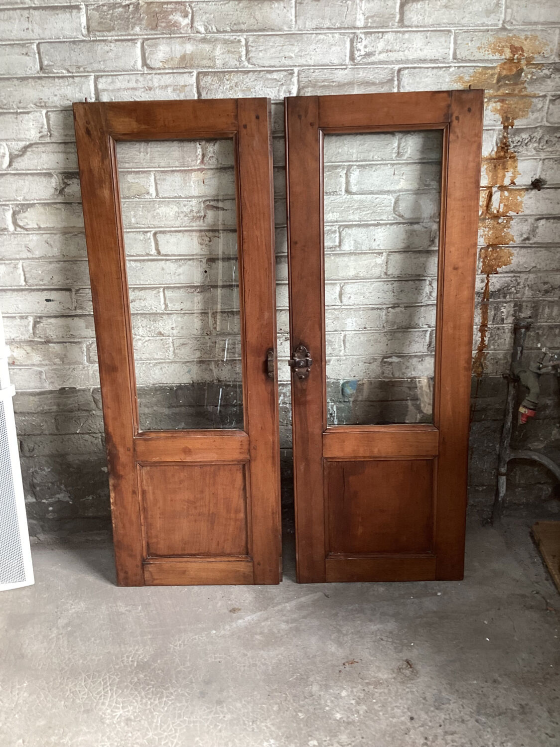 Pair of old glass cupboard doors