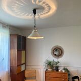 White metal suspension rises and falls