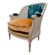 Fauteuil en bois, cannage et velours