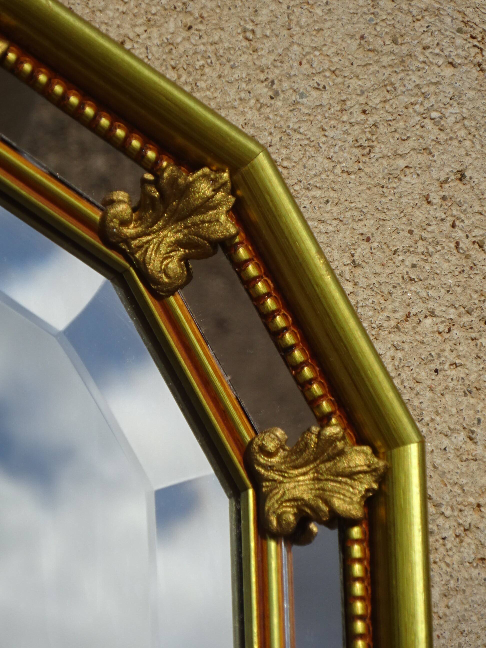 Hallway mirror, gilded frame, curtains and fleur-de-lis