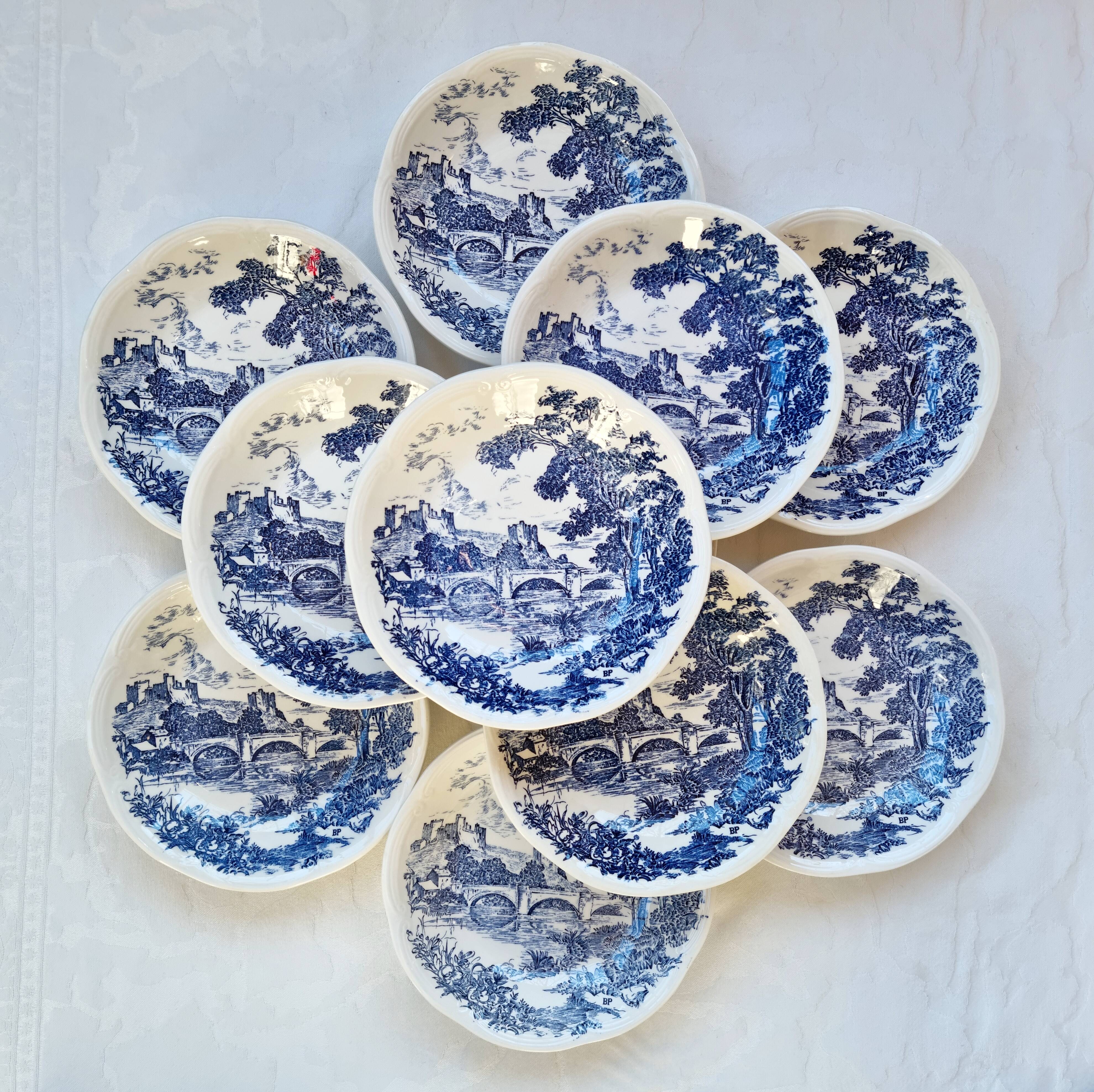 Lot de 11 assiettes calottes  de Gien