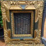 Pair of baroque frames in vintage gilded wood