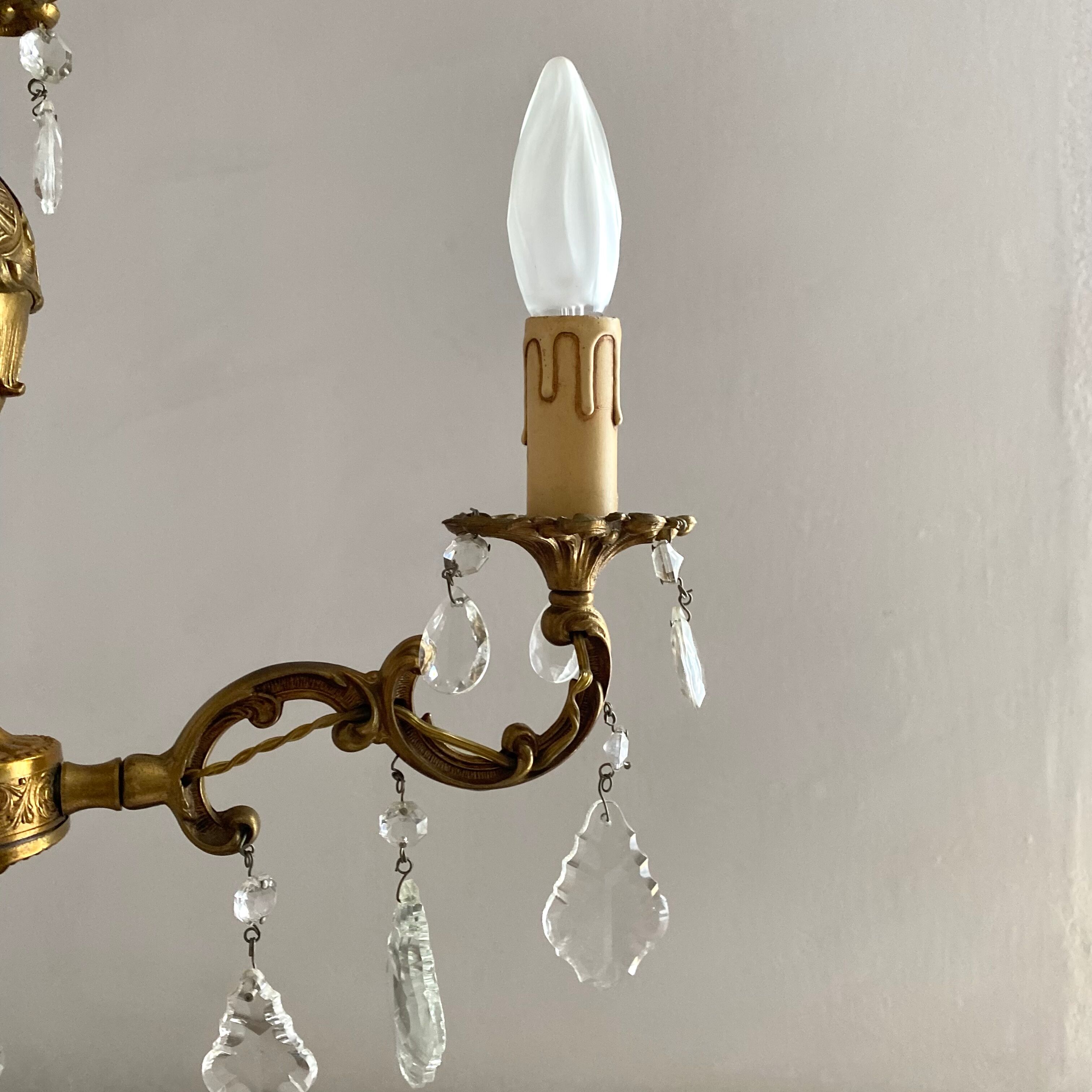 Chandelier with tassels and brass