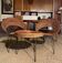 Set of 2 wicker armchairs and coffee table Raoul Guy 1950