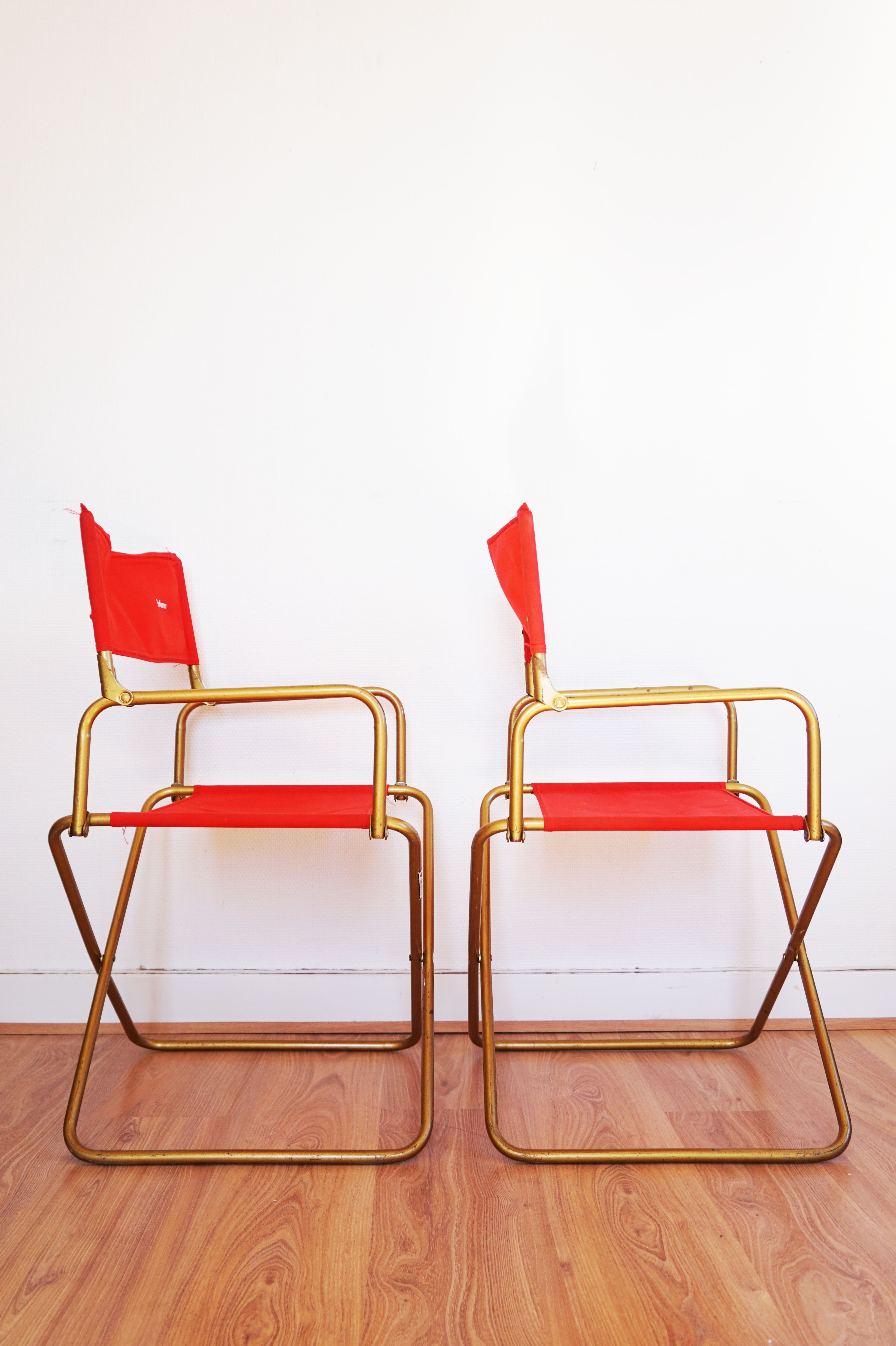 Red vintage pair of lafuma folding chairs