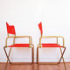 Red vintage pair of lafuma folding chairs
