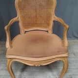 Louis XVI style caned armchair
