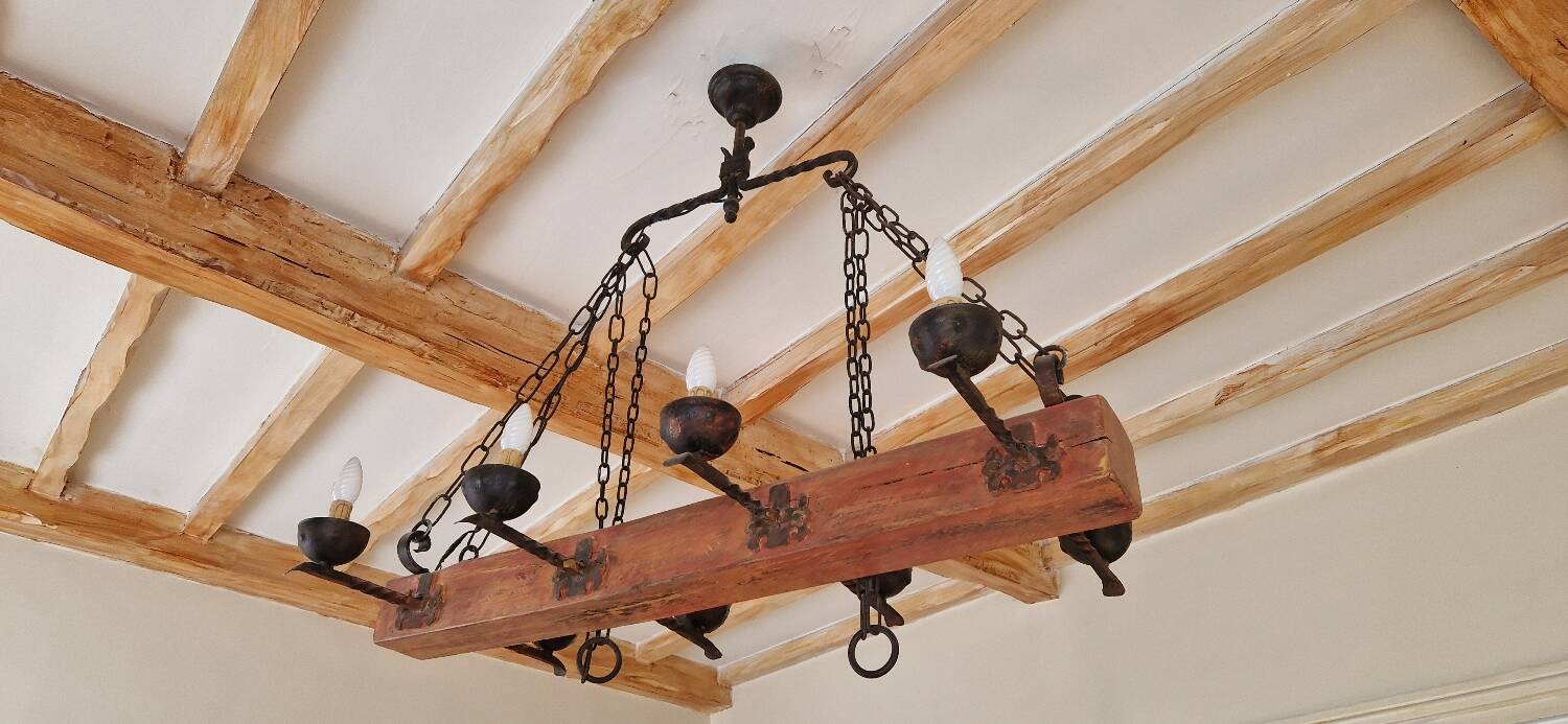 Wood and forged metal chandelier