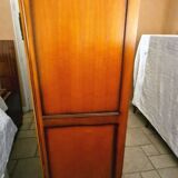 Wooden style wardrobe, 3 doors and 9 internal shelves.