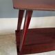 Vintage TV table with casters and 2 shelves years 60 varnished