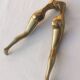 “woman’s legs” nut cracker in bronze
