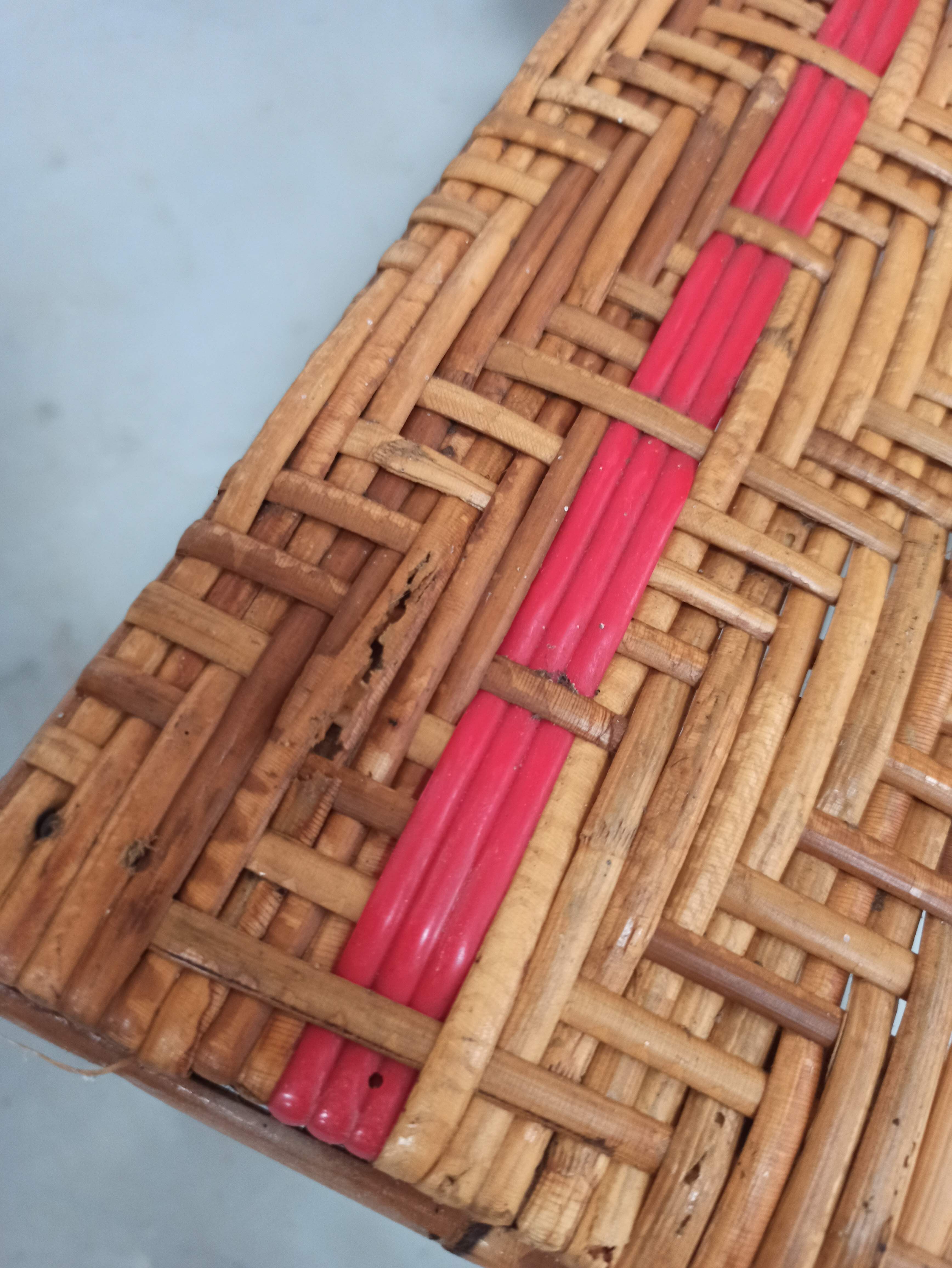 Sunbathing sunbathing in wicker rattan wood deckchair red lounger