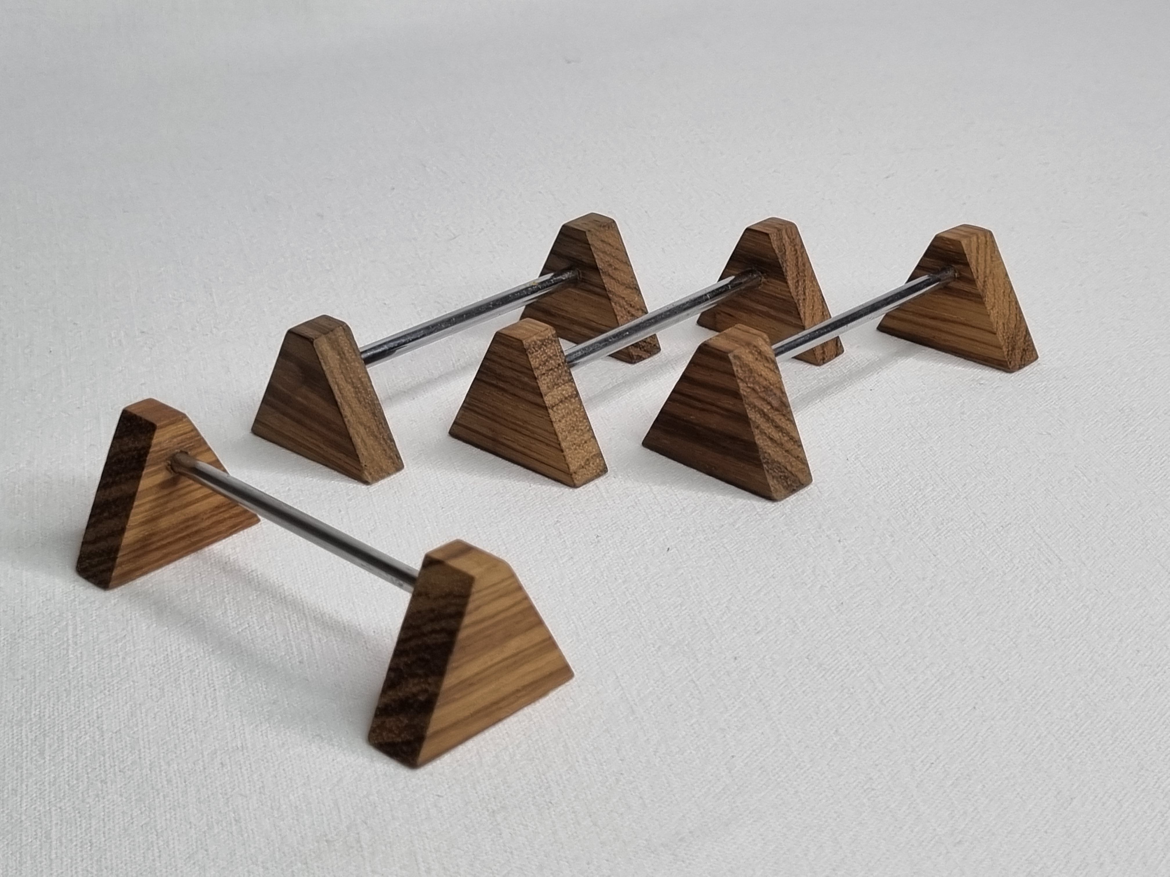 Set of four vintage metal and wood knife holders