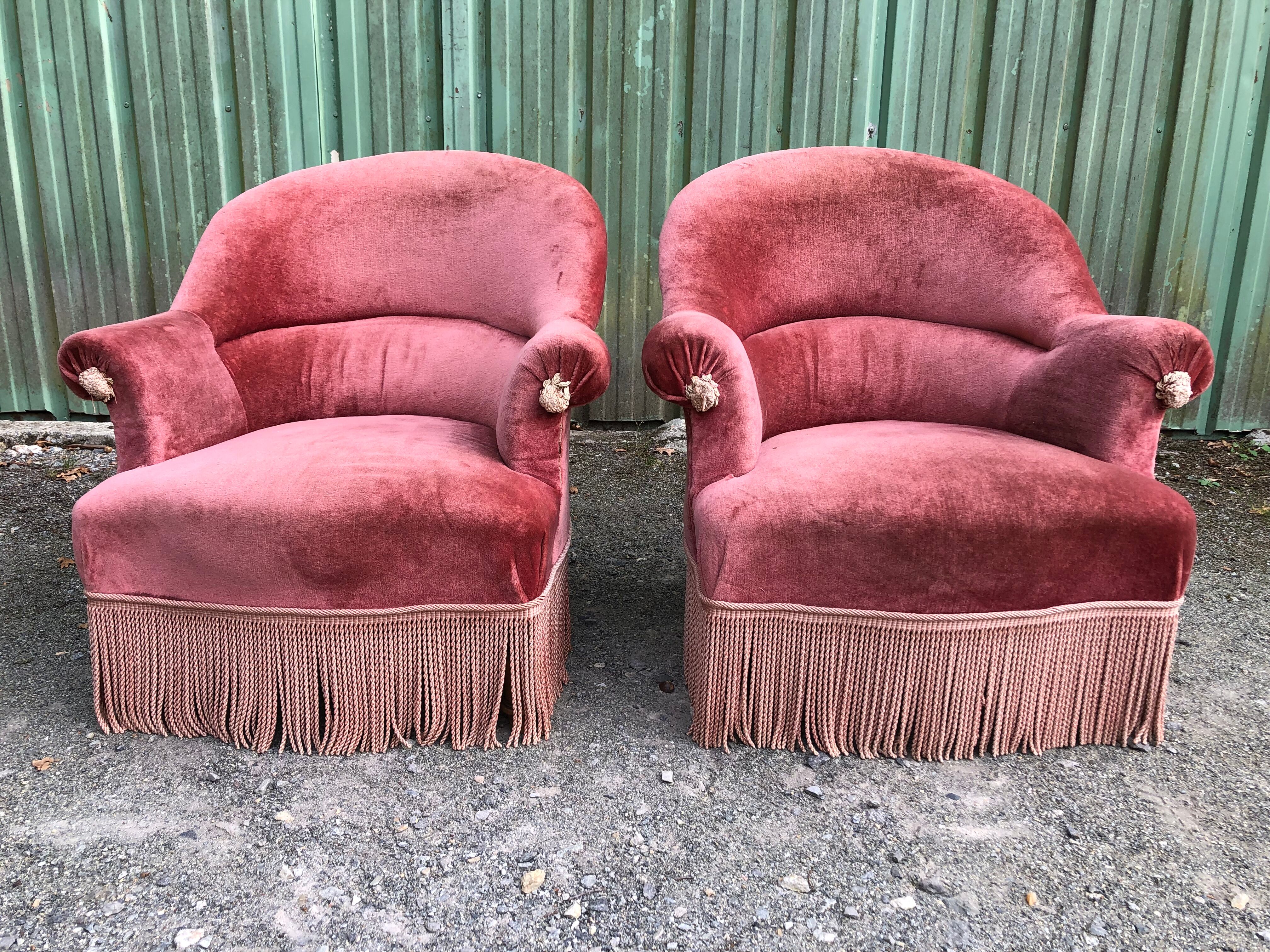 Duo de fauteuils vintage crapaud en velours saumon