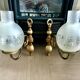 Pair of vintage wall sconces in brass and frosted engraved glass.