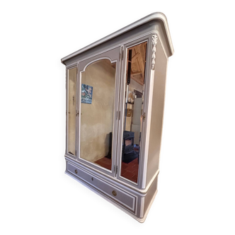 Three-door glass wardrobe