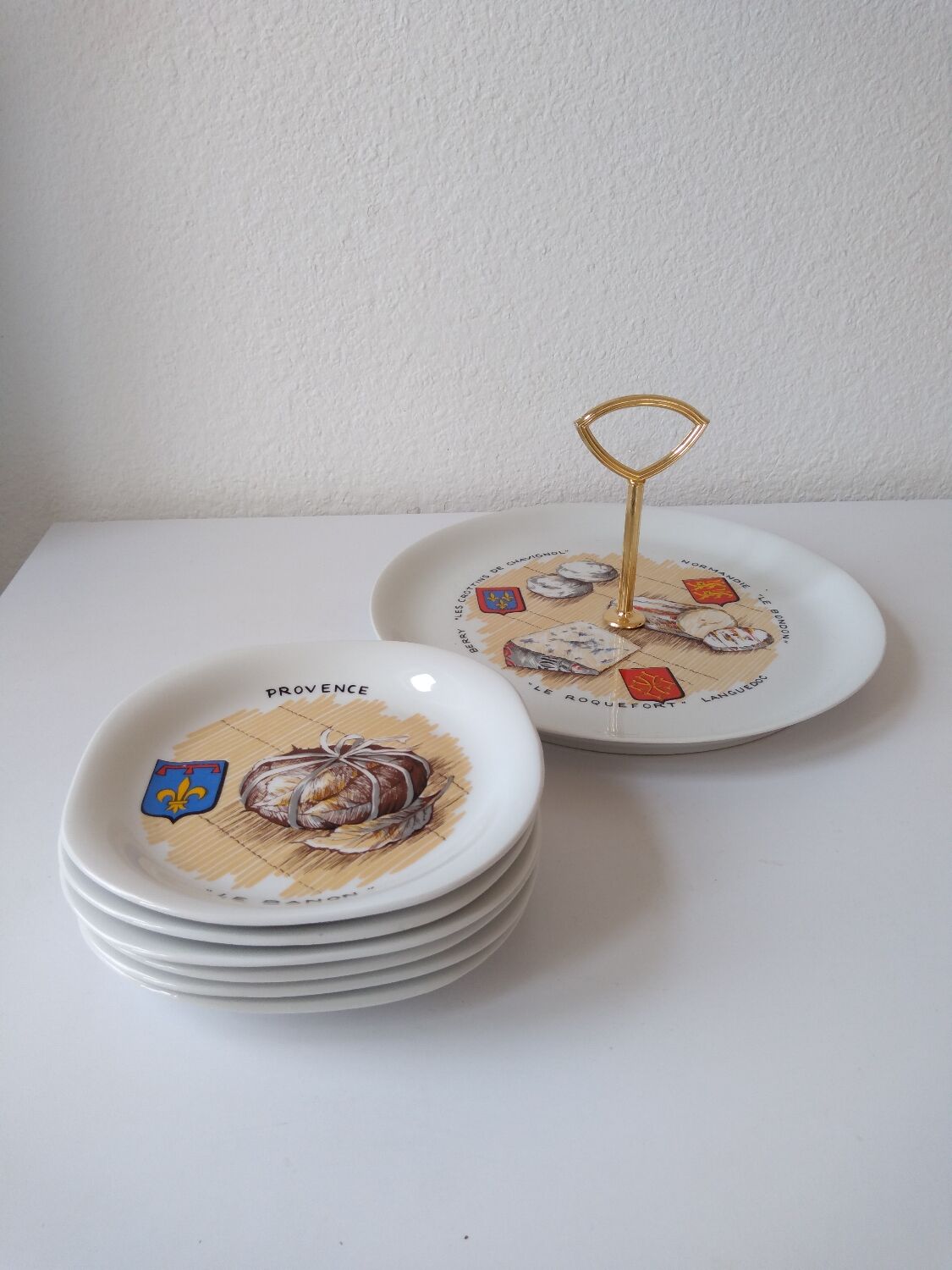 Limoges porcelain cheese service with drawing of regional cheeses and coats of arms 1 tray and 6 plates