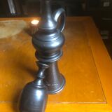 Ceramic pitcher shape candlestick, black color and signed at its base Jean Marais