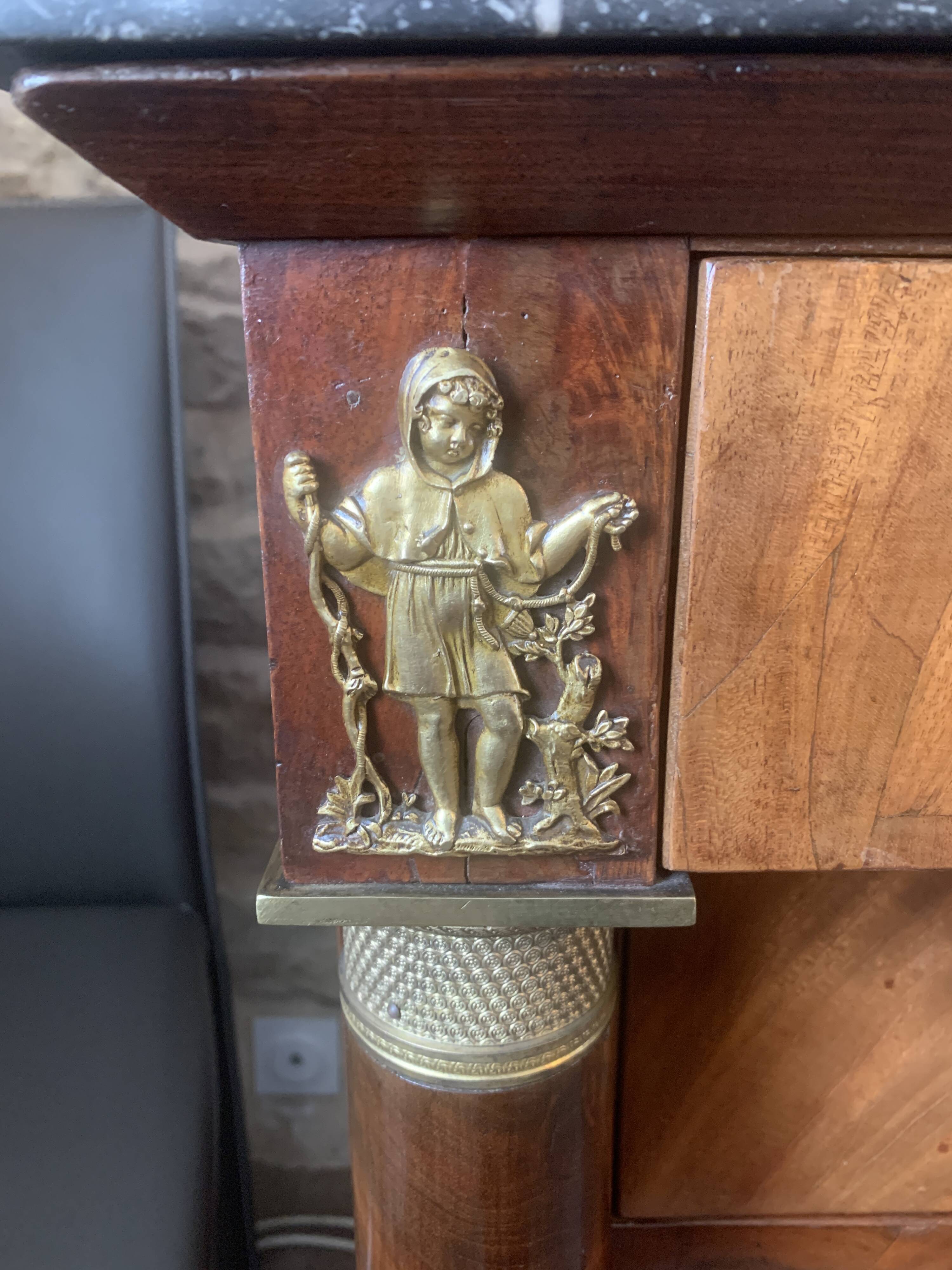 Empire chest of drawers with columns, 19th century mahogany