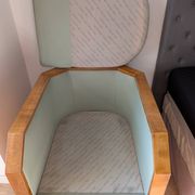 Vintage armchair Hugues Chevalier Paris — Almond green leather & Wood