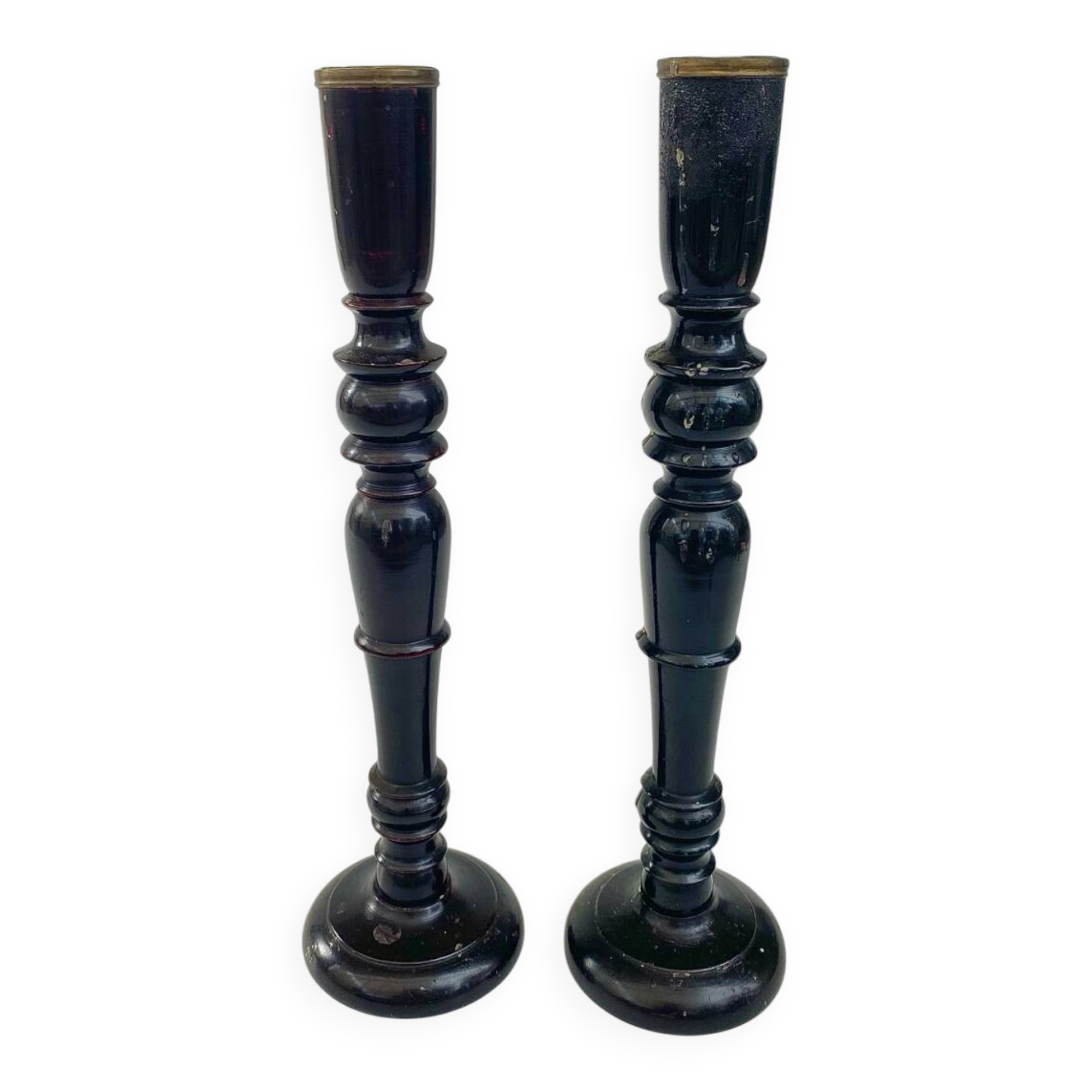 Pair of antique ebonised wooden candlesticks from the 19th century.