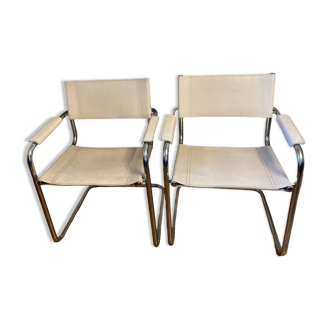 Stainless steel and white leather armchairs