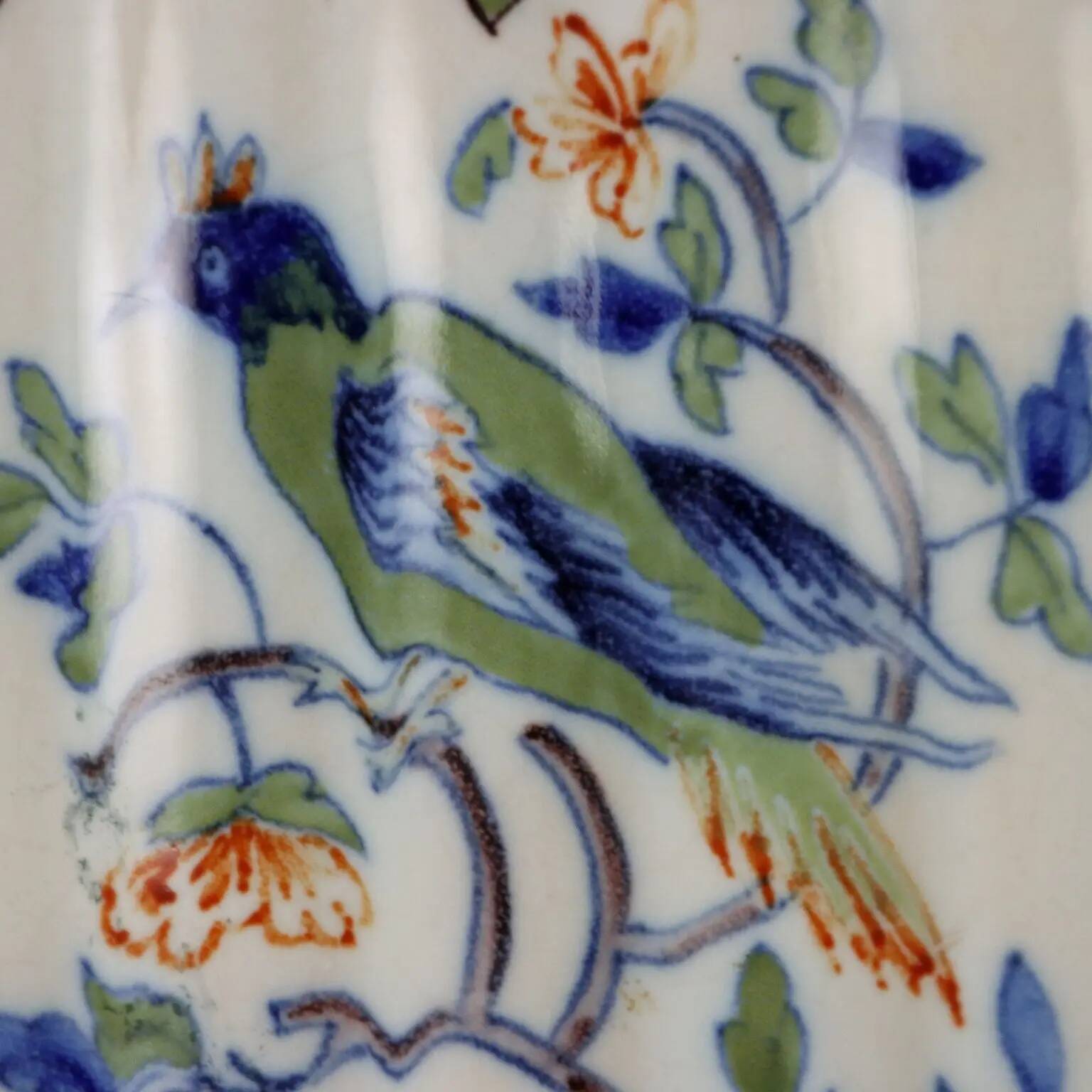 Ancient vase fully decorated with ceramic plants, 20th century.