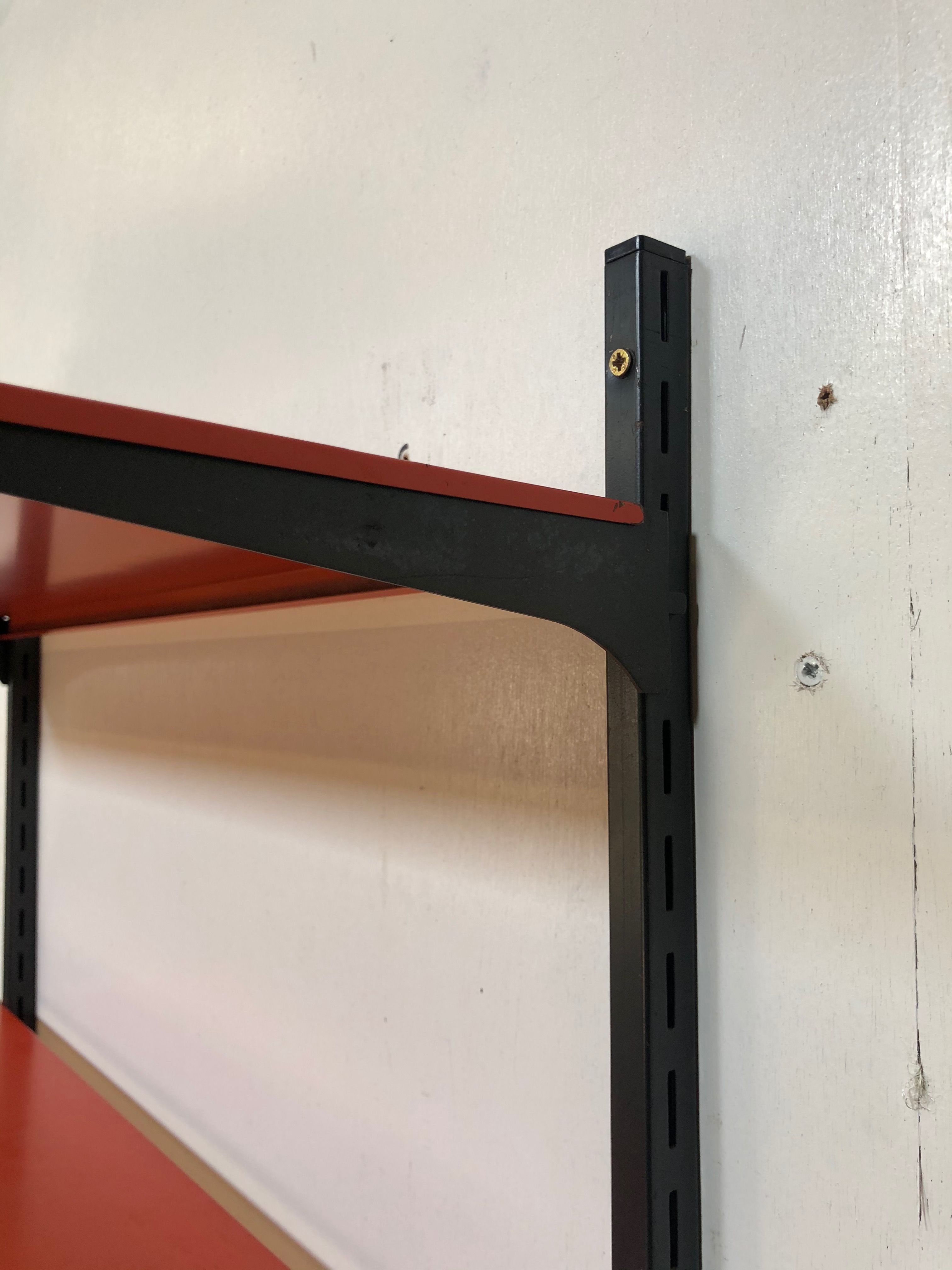 Tomado Holland vintage wall support black steel orange from the 1970s