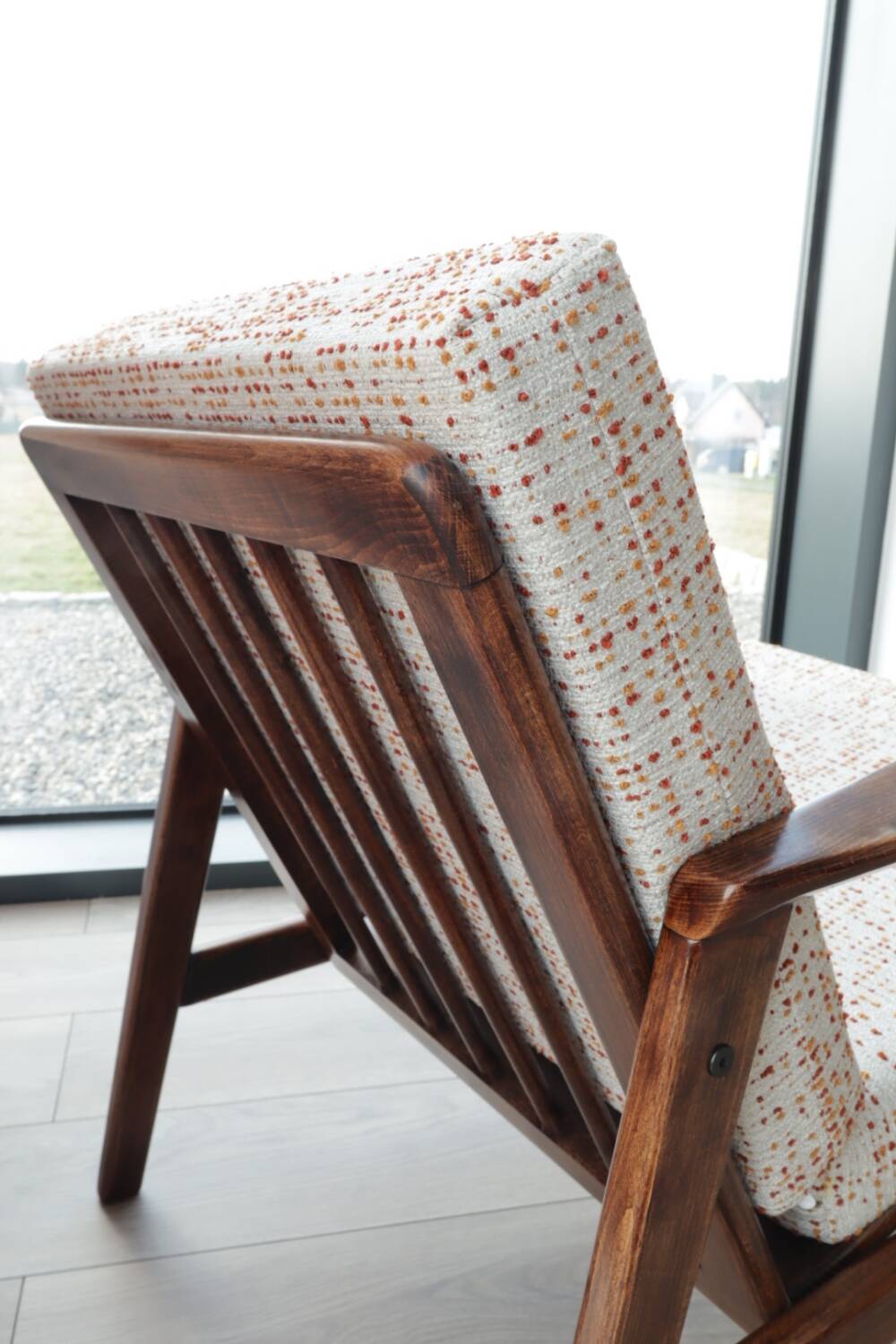 Vintage Danish boucle armchair with orange polka dots from the 1960s.