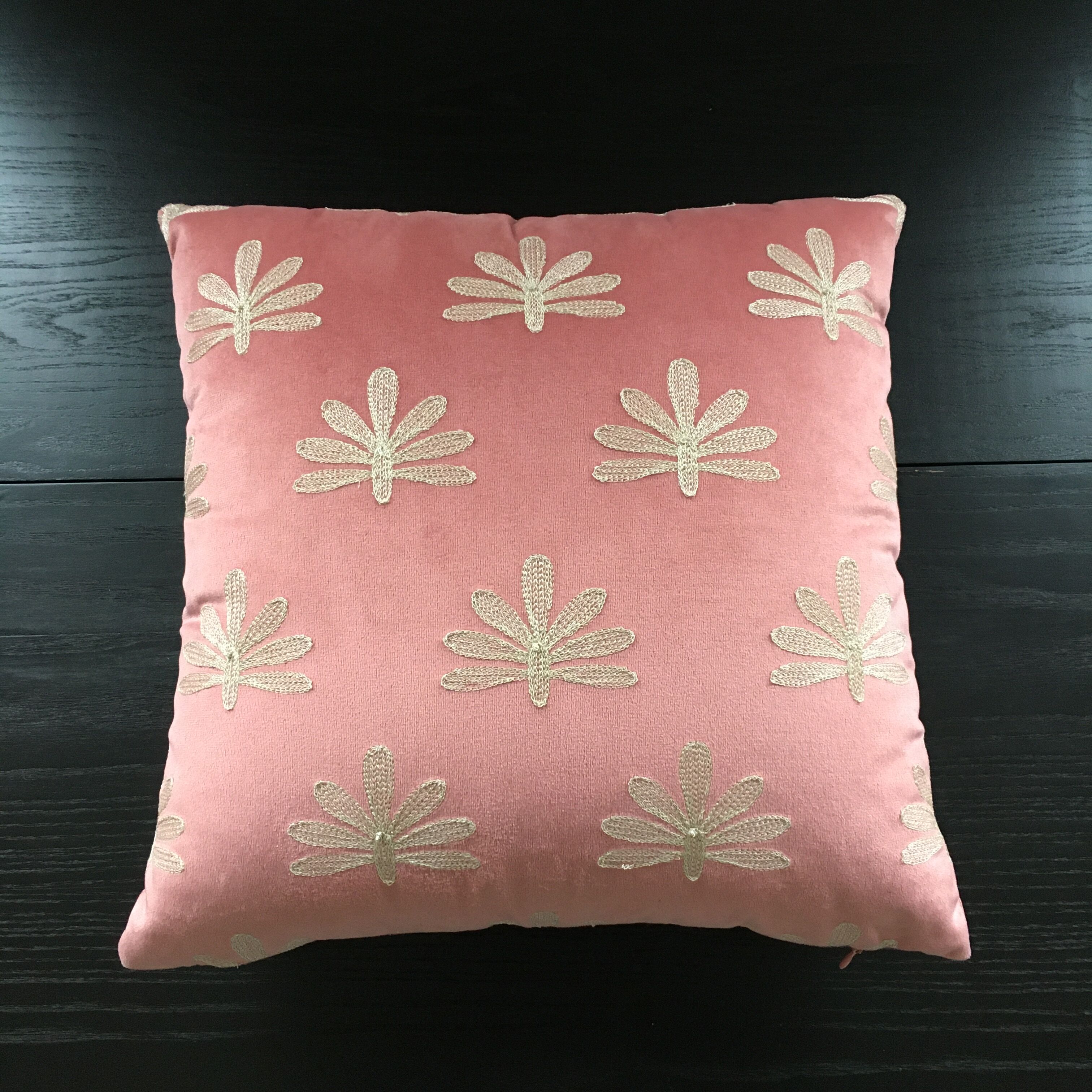Pink cushion embroidered palm trees
