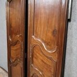 Pair of Louis XV period molded doors in solid walnut