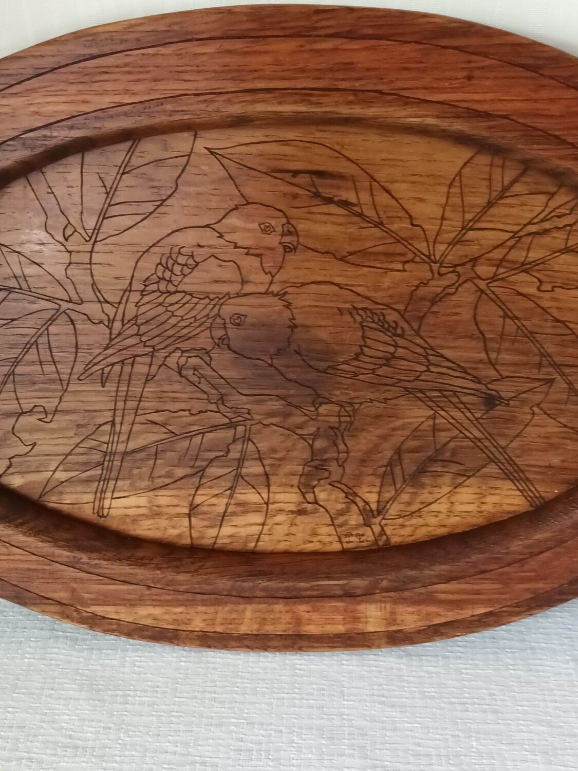 Vintage oak top engraved parrots