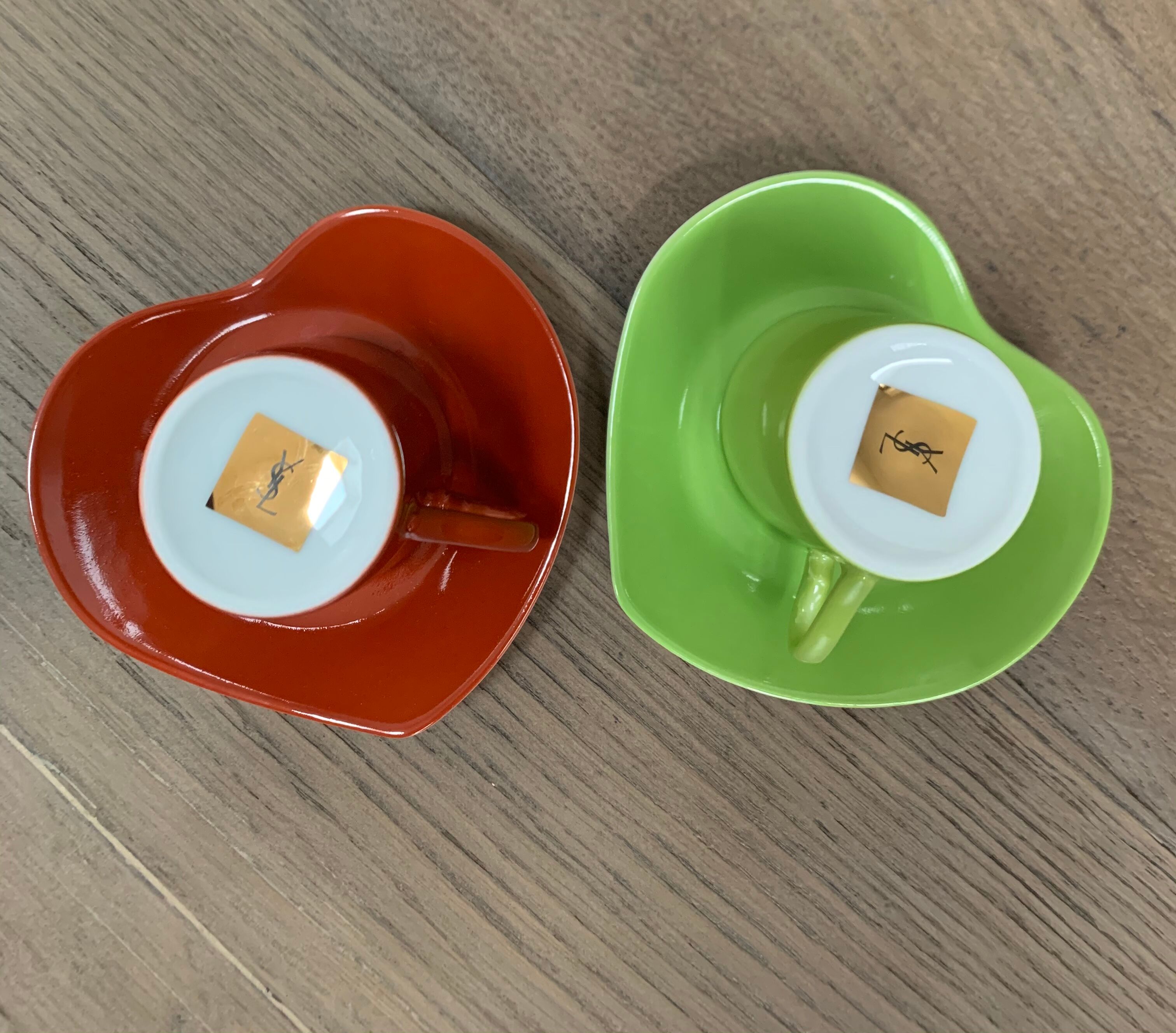 Two cups and saucers in porcelaine Yves Saint Laurent