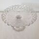 Old cup in molded glass colorless decorative table mignardises