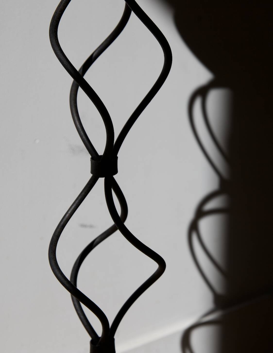 candlestick on wrought iron feet
