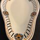Pair of art deco raviers signed Longwy and numbered, model Gerazine