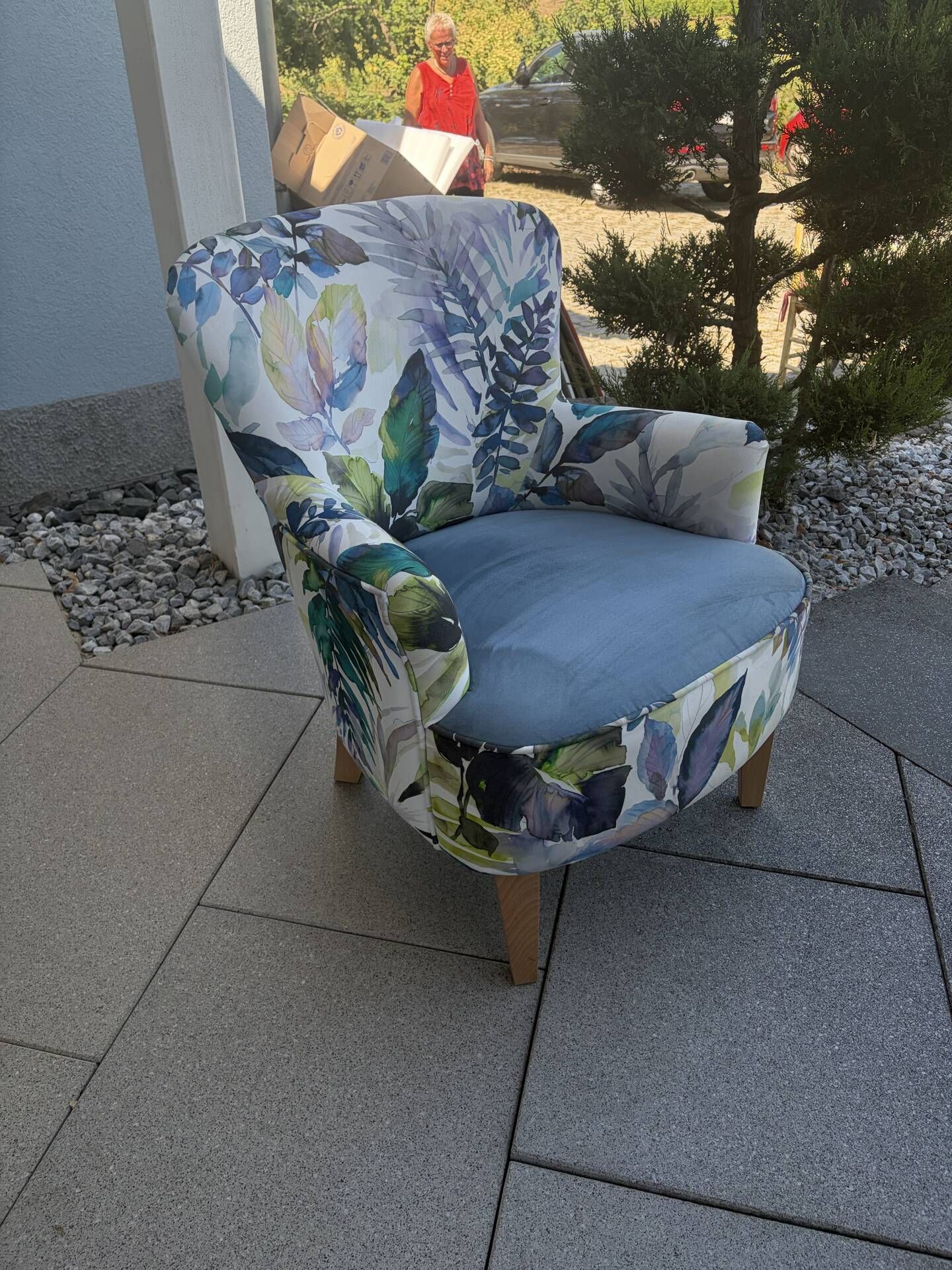 Contemporary ALC frog chair, reupholstered in watercolour floral fabric.