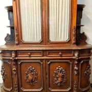 Important two-body buffet from a hunting lodge in carved walnut, Renaissance style.