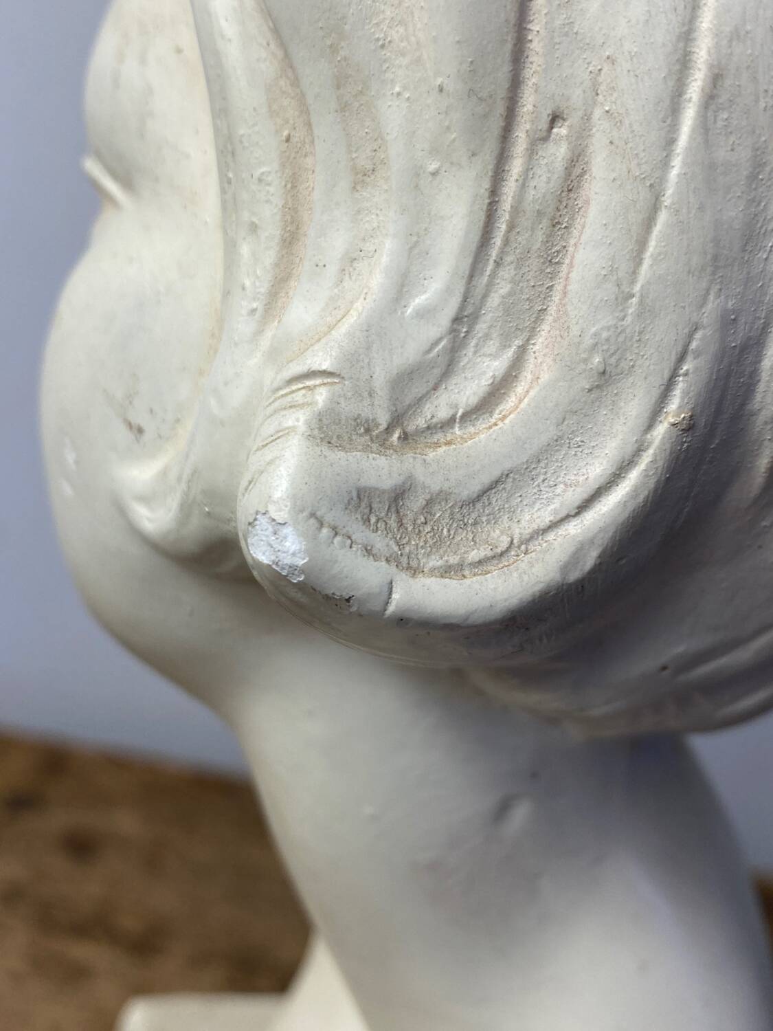Plaster bust of a young girl
