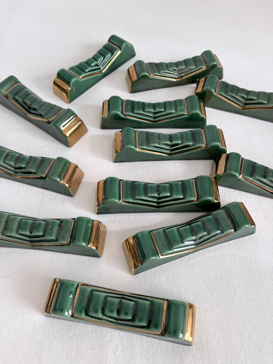 12 vintage green and gold ceramic knife holders from the 50s