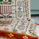 Coussin ancien broderies ethniques 51x34cm