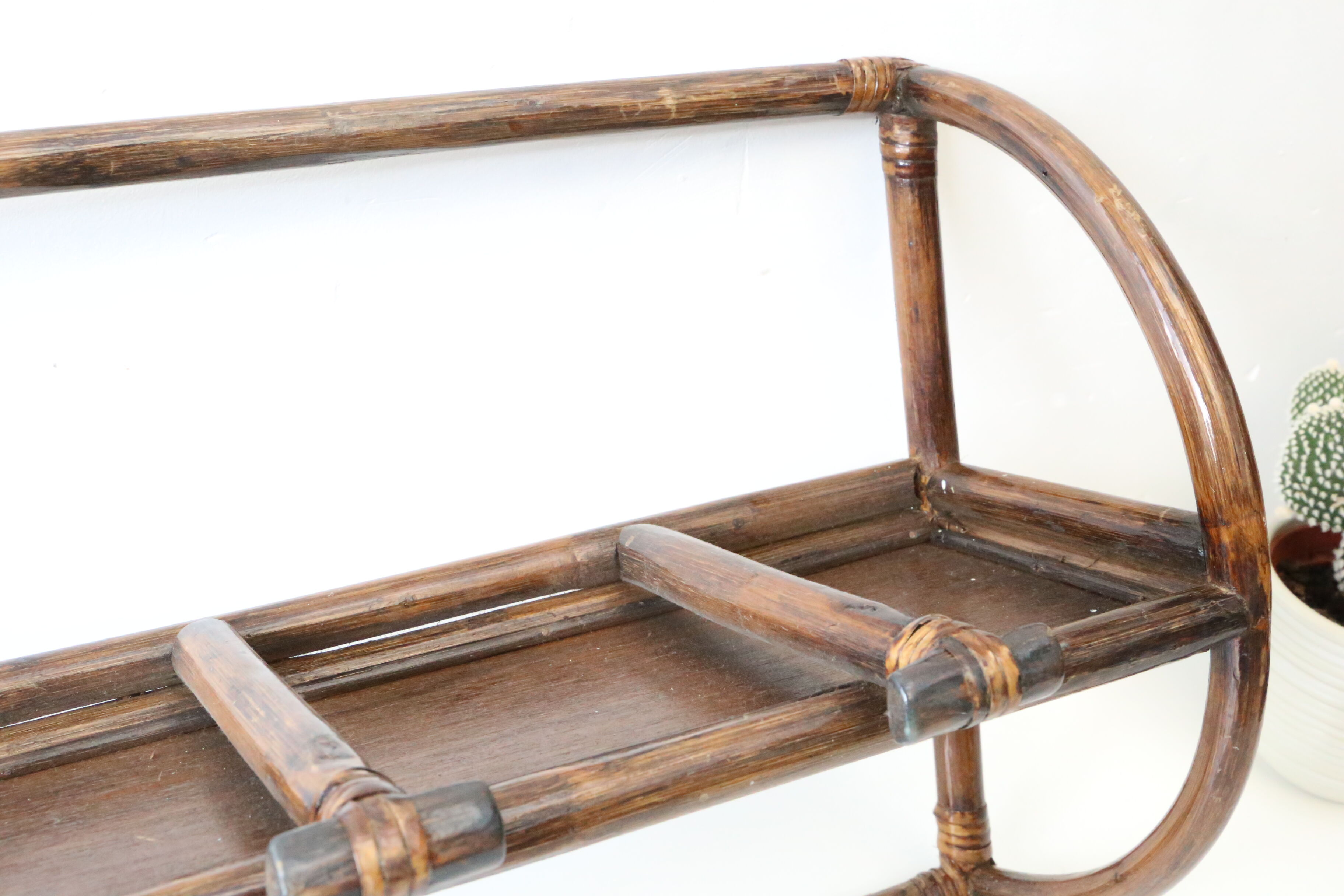 Rattan wall coat holder