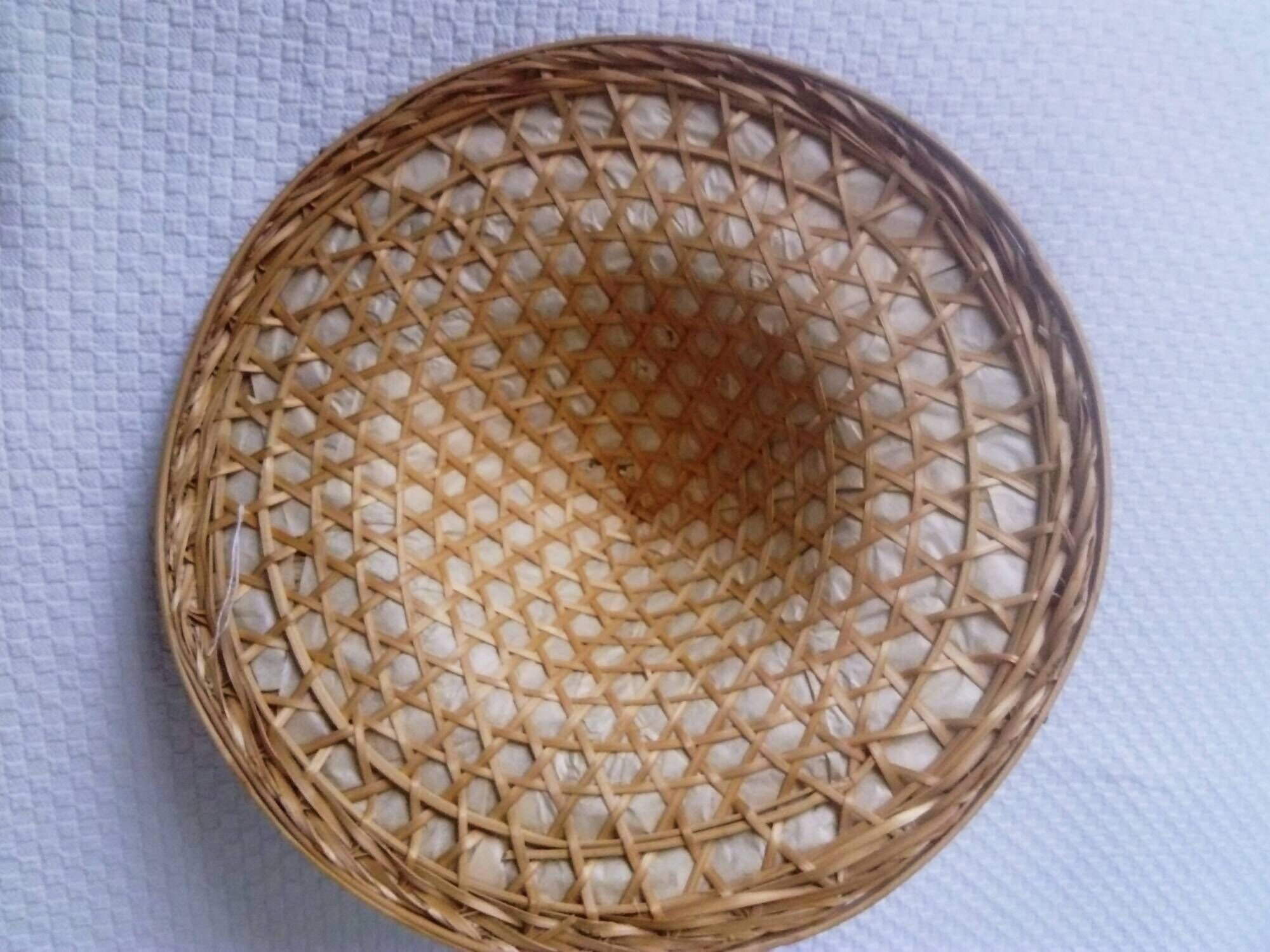 braided Asian hat. palm, bamboo, straw, wicker