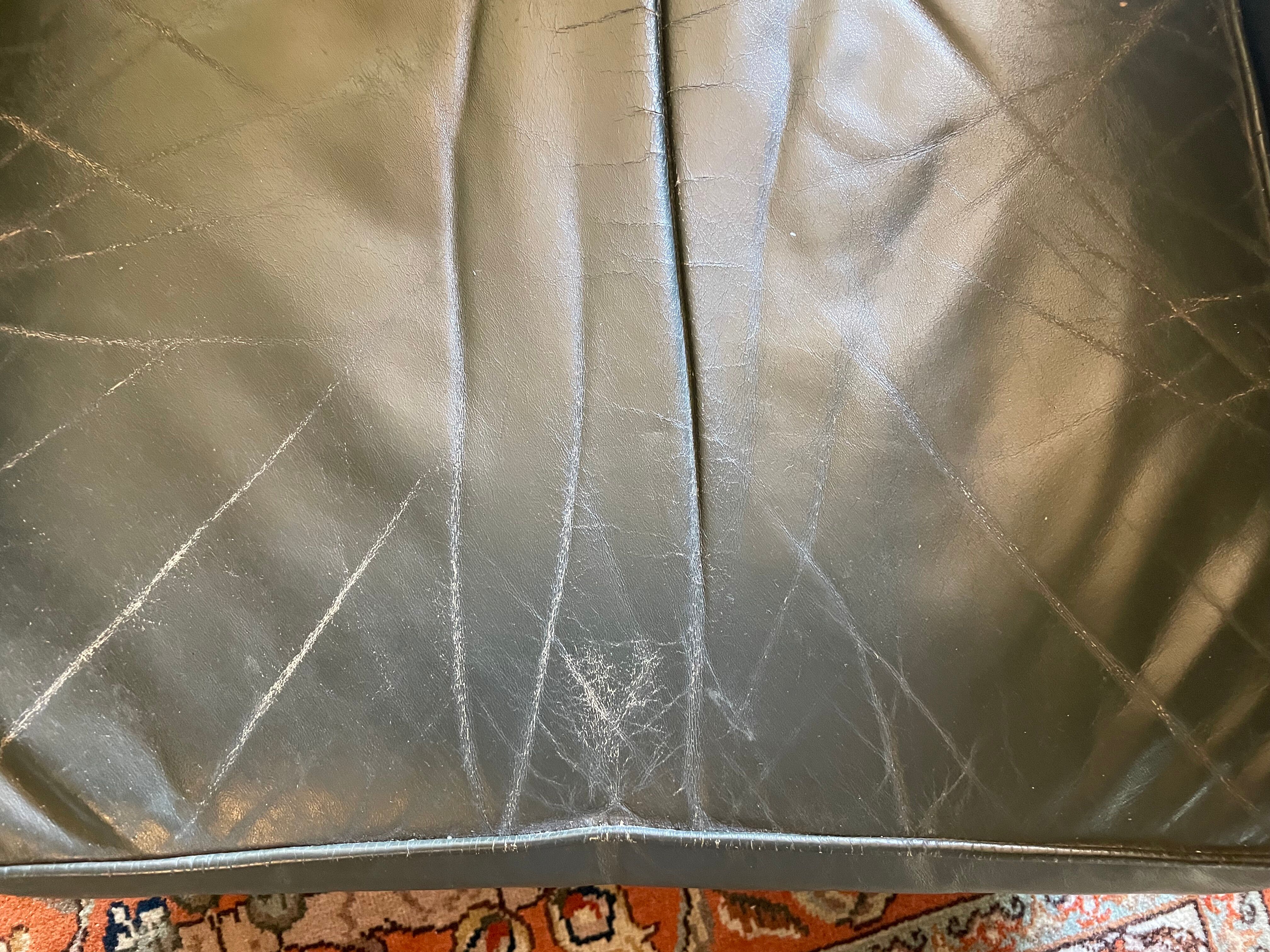 Green leather club chairs