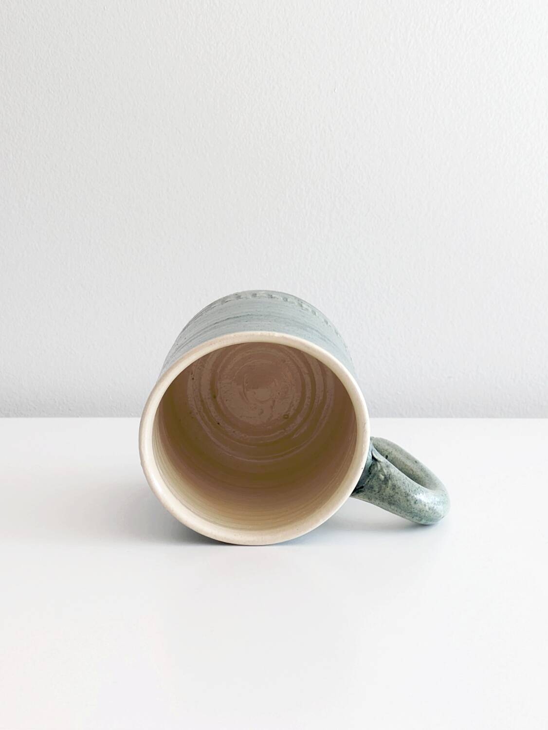 Handcrafted glazed ceramic mug signed. Saint Jorioz.