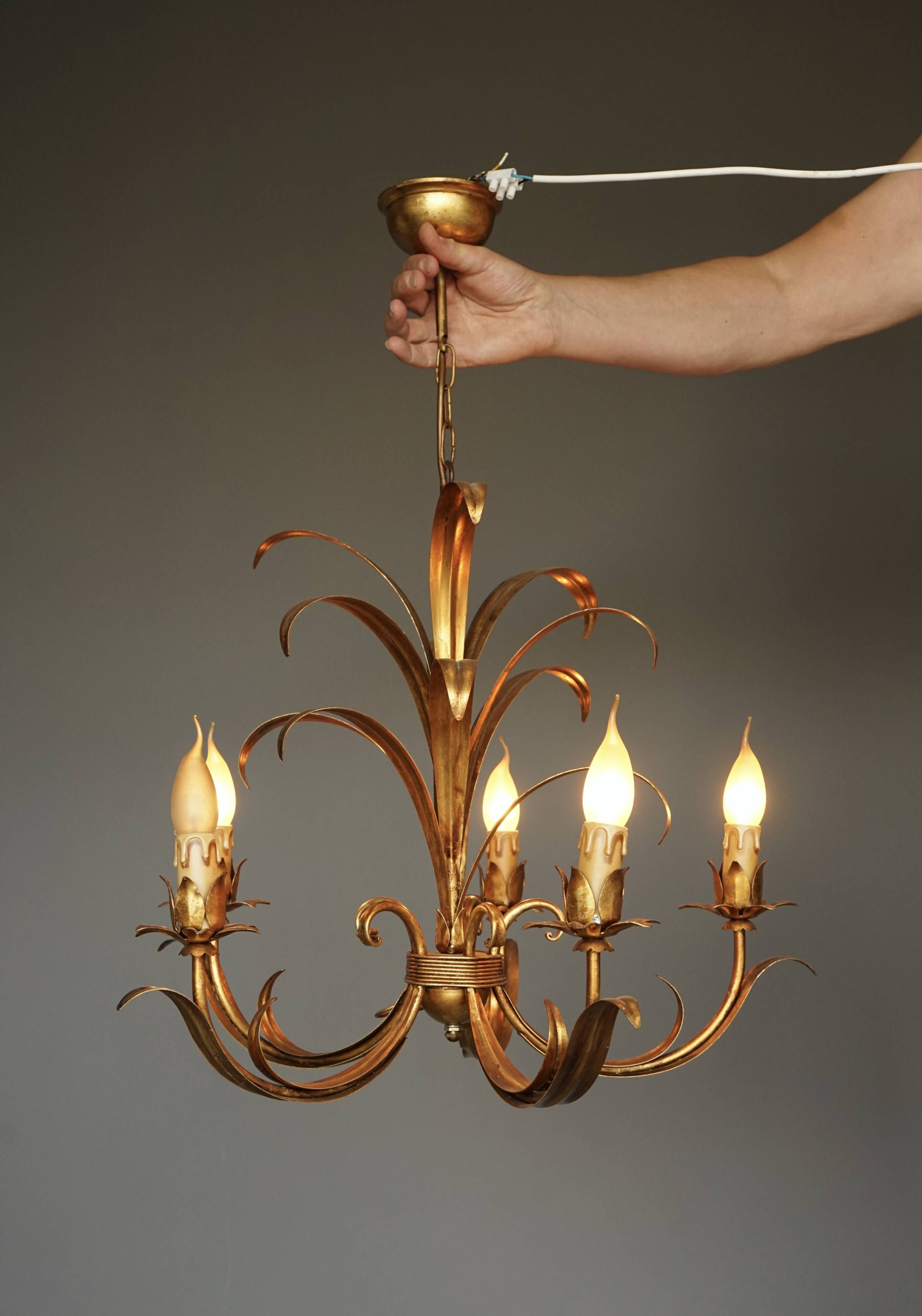 Vintage chandelier with 5 lights attributed to Hans Kögl. 1970s.